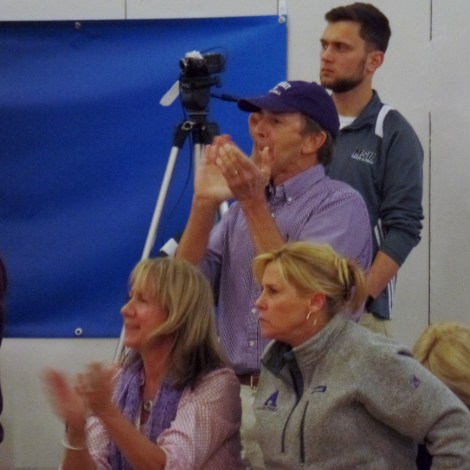 Amherst College fans cheering during game