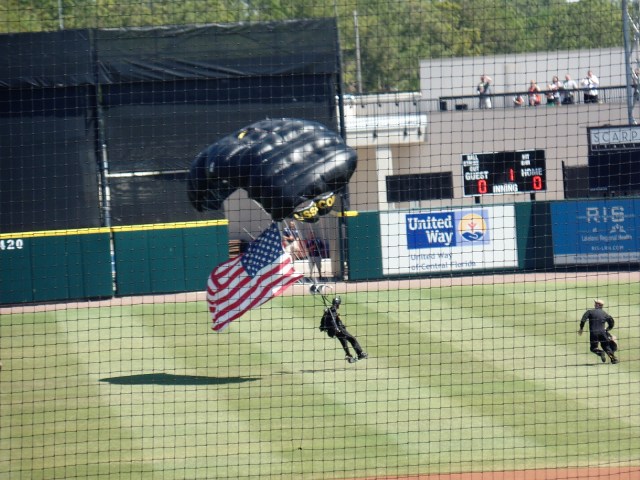 skydivers at Joker Marchand Stadium