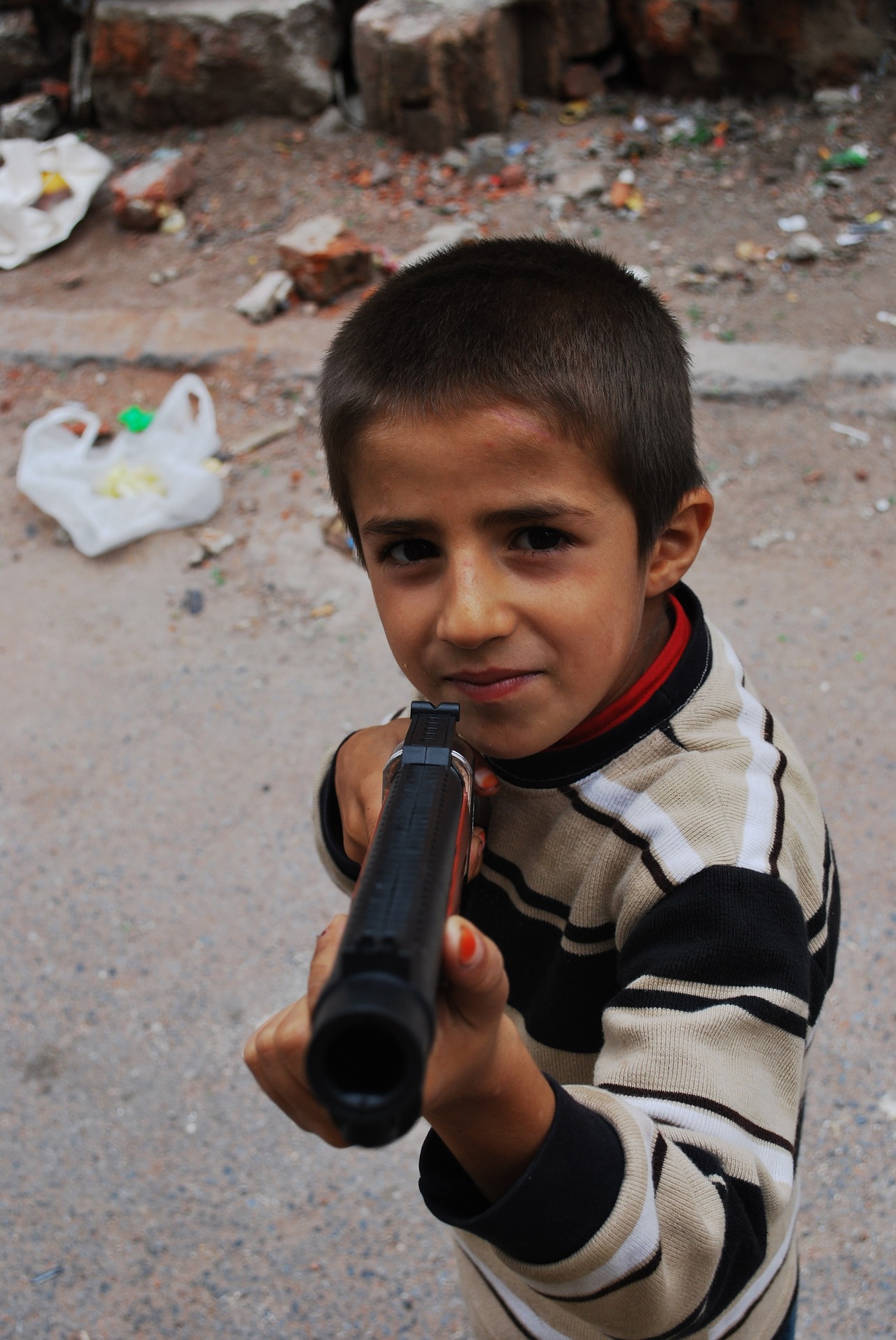 Boy with gun