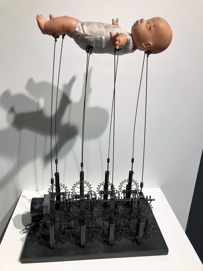 Machine with Abandoned Doll