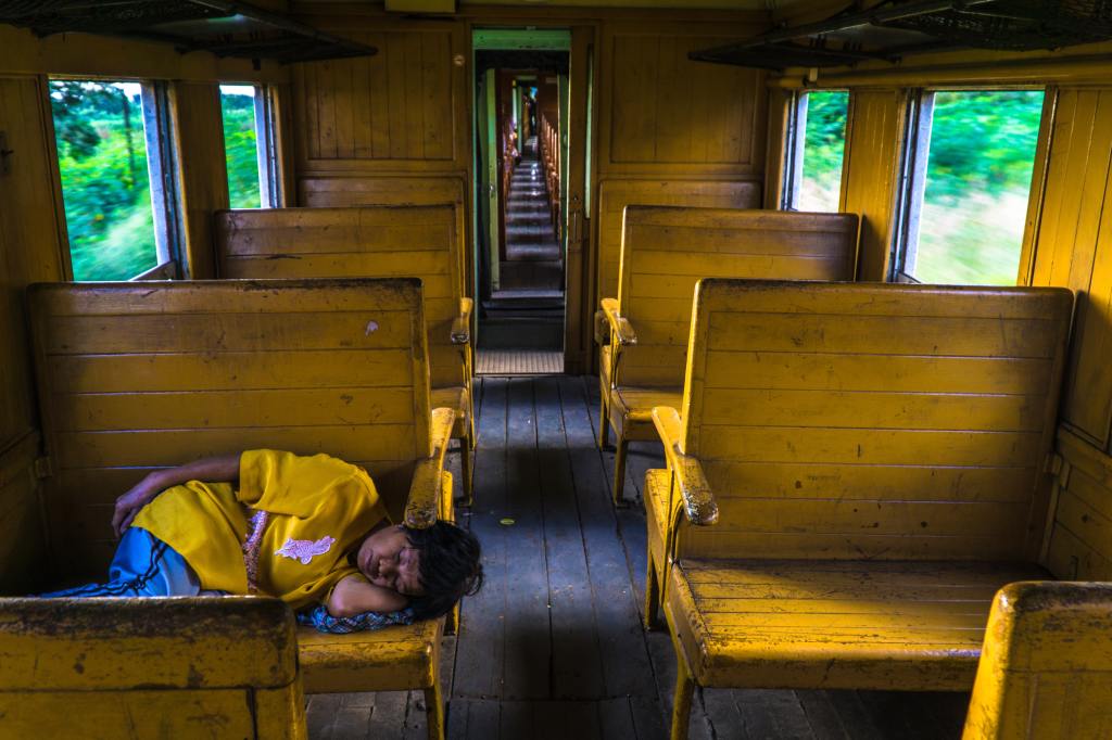woman sleeping on bench