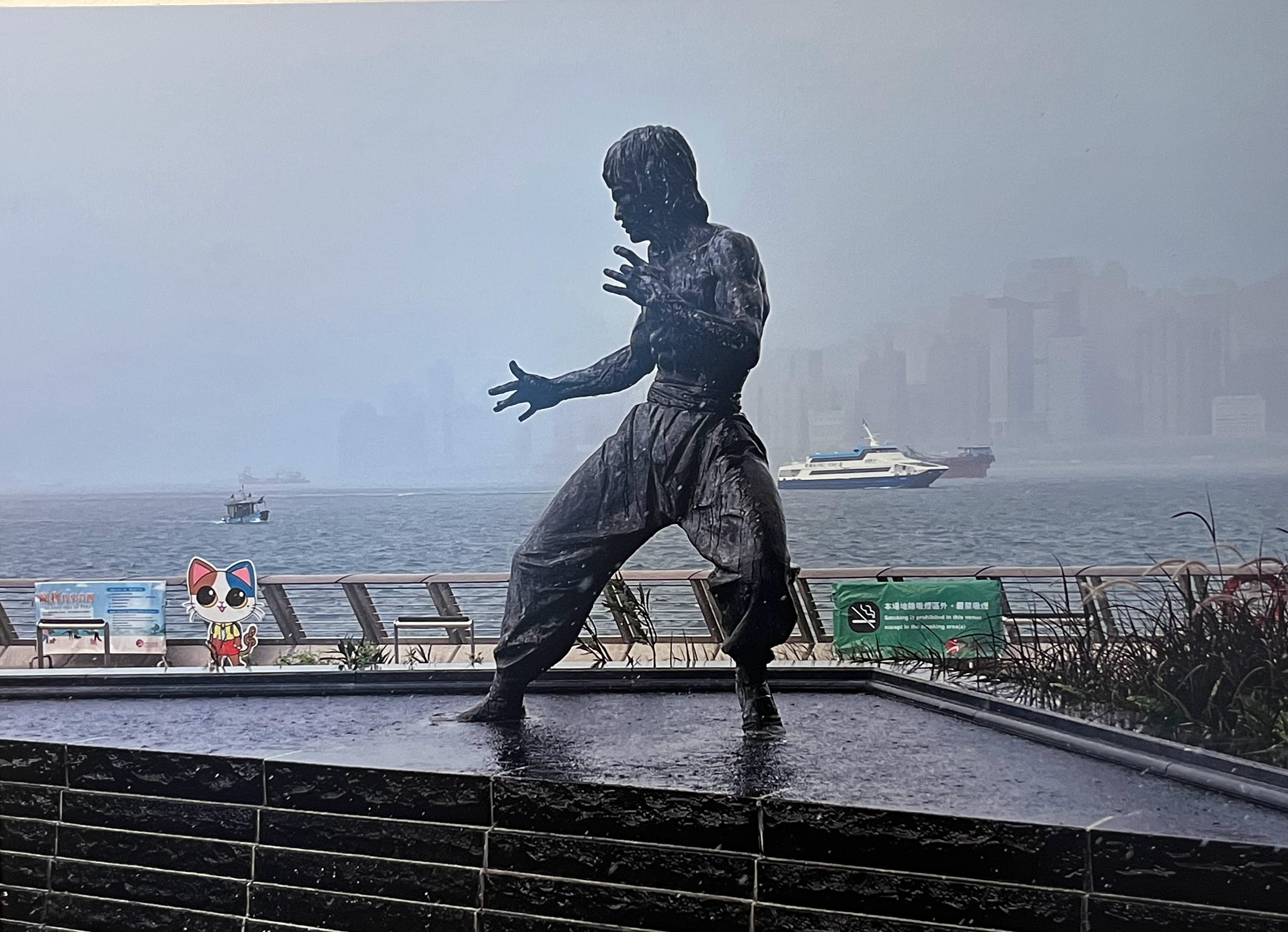8 ft. bronze statue on the Avenue of Stars in Hong Kong. By Cao Chong-en.