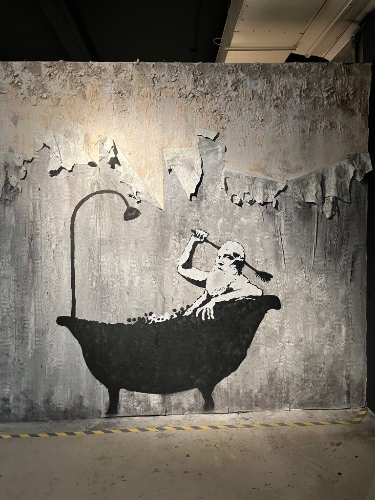 Bearded man taking a bath.